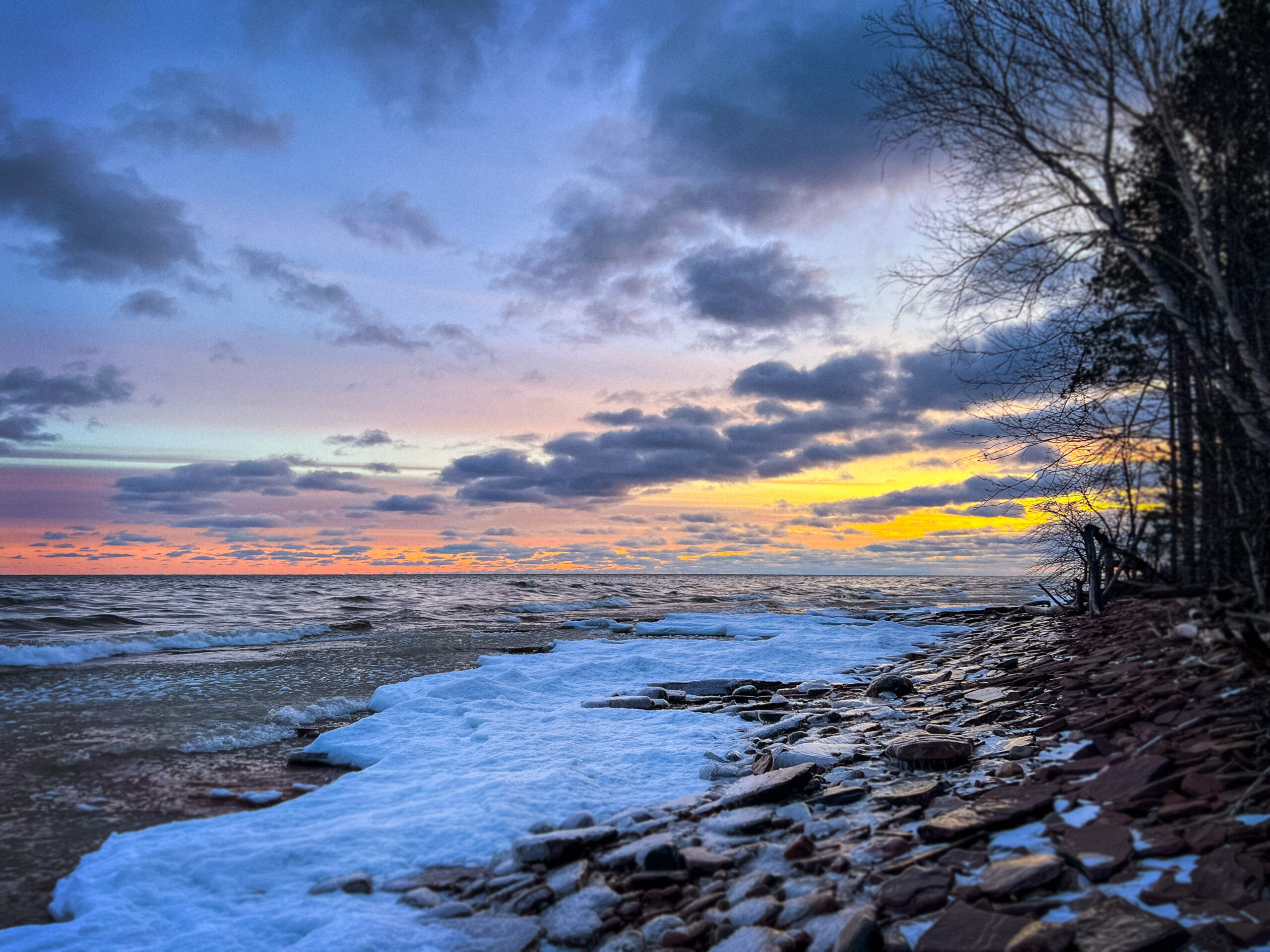 winter sunset over lake superior ontonagon michigan